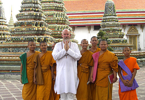 Ganga with Buddhist monks at the Temple of the Reclining Buddha in Bangkok