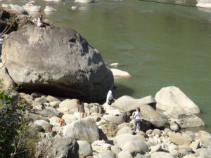 Meditating on the river bank