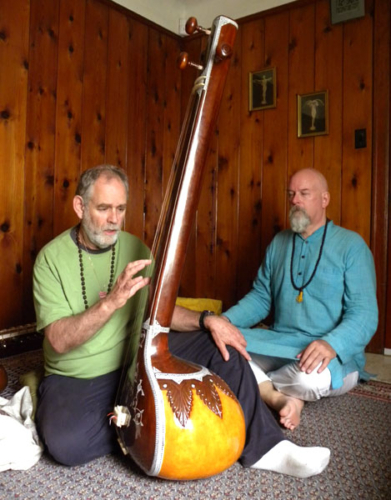 Ganga meditating while Gerry plays a raga