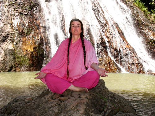 Tara meditating at waterfall on Koh Samui