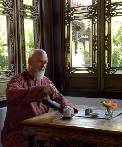 Ganga pouring tea at the Chinese Gardens in Portland