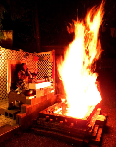 Dzogchen Khenpo Choga Rinpoche performing fire puja at the Dzogchen Retreat Center in Oregon