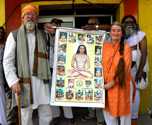 Ganga and Tara holding banner of Babaji and the 18 Tamil Siddhas at the beginning of the procession.