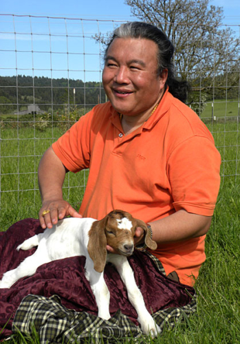 Dzogchen Khenpo Choga Rinpoche with kid