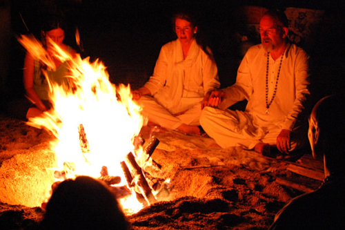 Ganga and Tara perform homa (fire puja) on the beach on Koh Samui