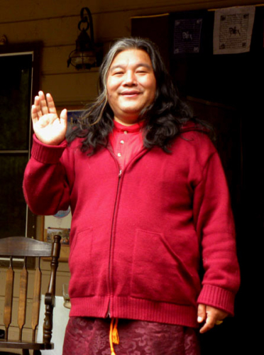 Khenpo Choga waving goodbye as Ganga and Tara leave to continue their American tour
