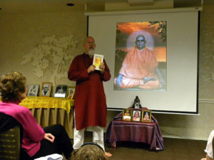 Ganga describing Tapaswiji Maharaj, the saint who lived 185 years, at the Rahm Group in Novato