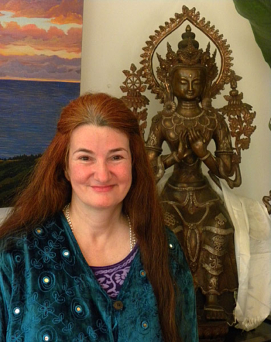 Tara with Buddha Maitreya after class in Carmel