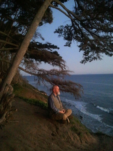 Ganga meditating on cliff in Santa Barbara